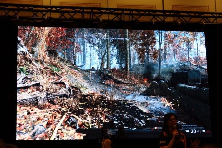 現場示範玩《Battlefield V》，即使開啟了 RTX，都不覺得有任何延遲，而內裡的樹影和水上的倒影都十分真實。