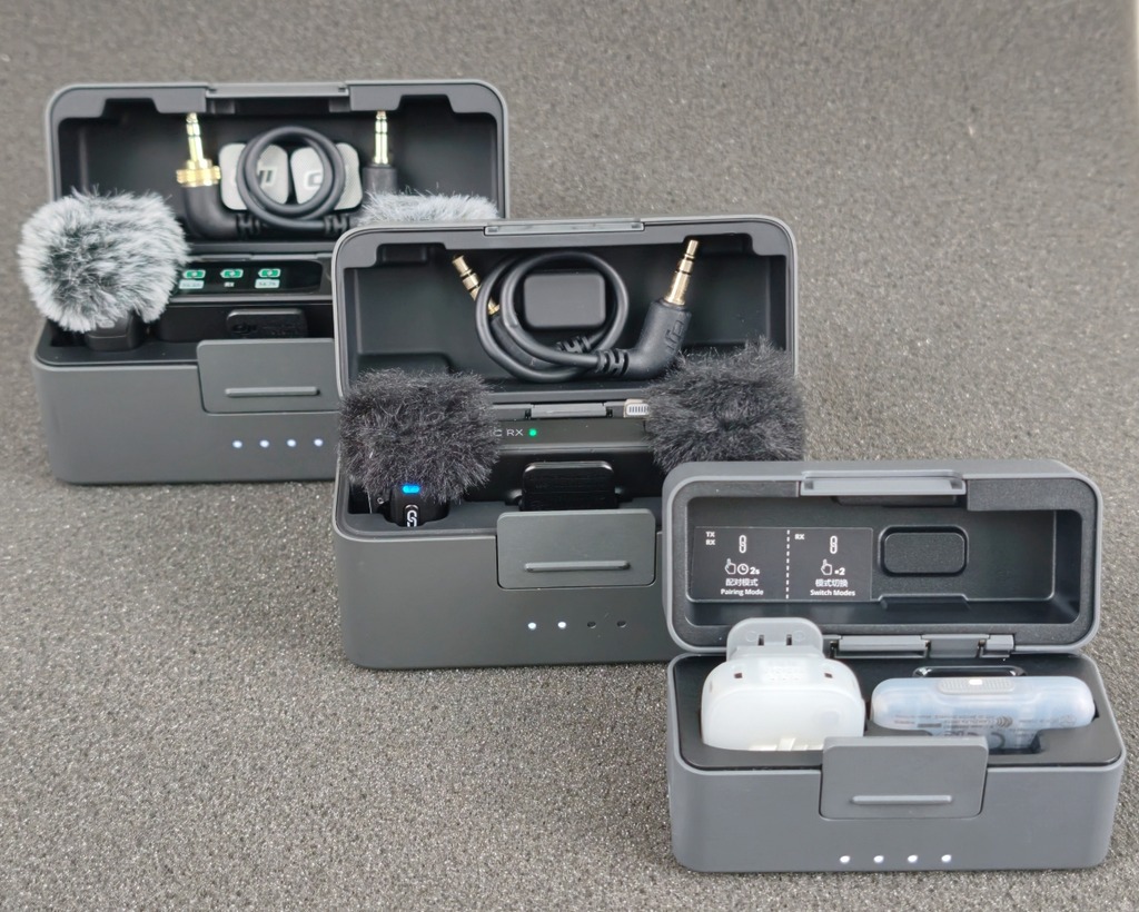 三款 DJI Mic 連充電盒大細比較： （從左至右）Mic 3 、Mic Mini（2 發 1 收相機版）、Mic Mini 2 (1 發 1 收手機版）